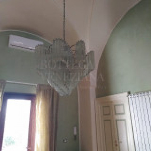 Ade vintage chandelier in murano glass, traditional plate processing.