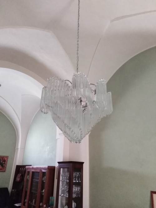 Ade vintage chandelier in murano glass, traditional plate processing.